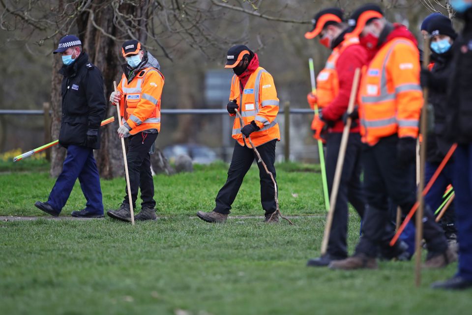 Search crews are seen inspecting Clapham Common as part of the investigation into Sarah's disappearance