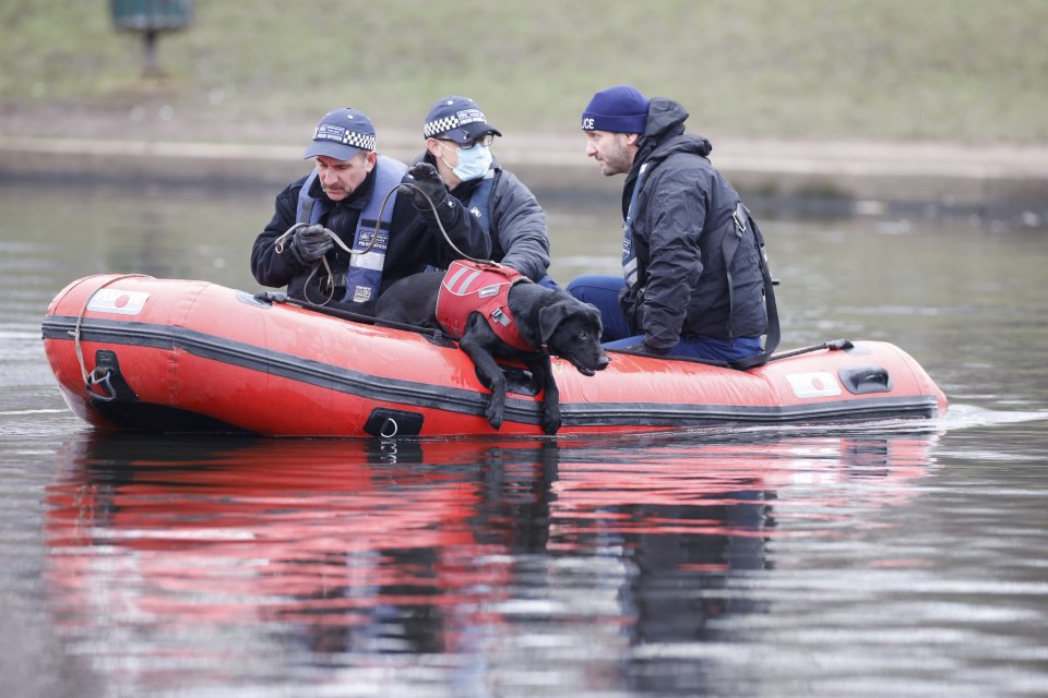 Police are seen searching Clapham Common ponds today