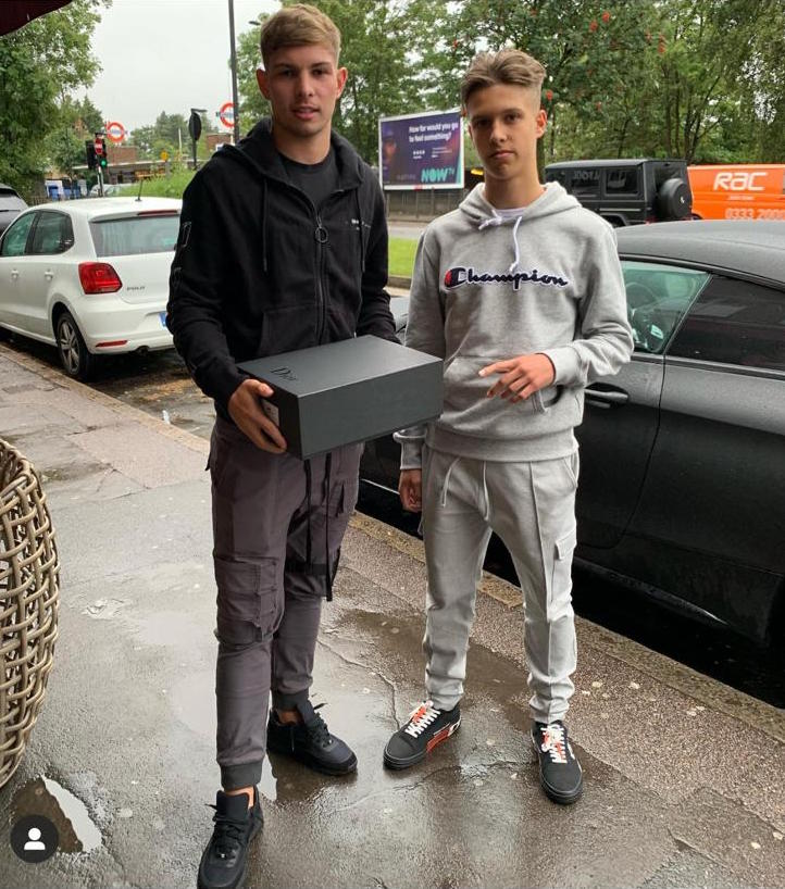 Arsenal youngster Emile Smith Rowe poses for a snap with his Dior trainers