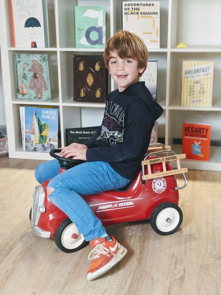 They were inspired after their eldest was given this red toy truck for free