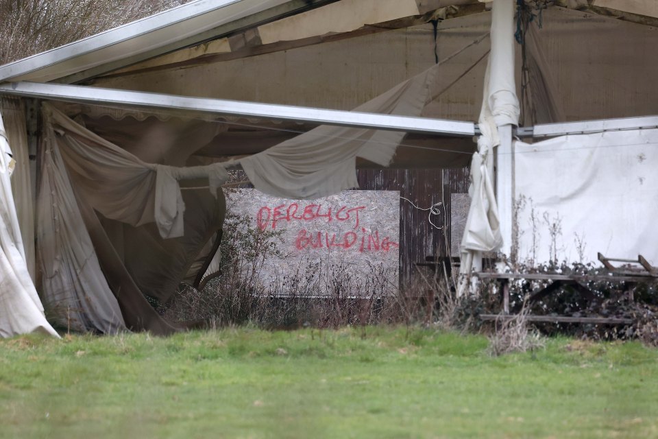 Police search an area of a golf driving range in Kent