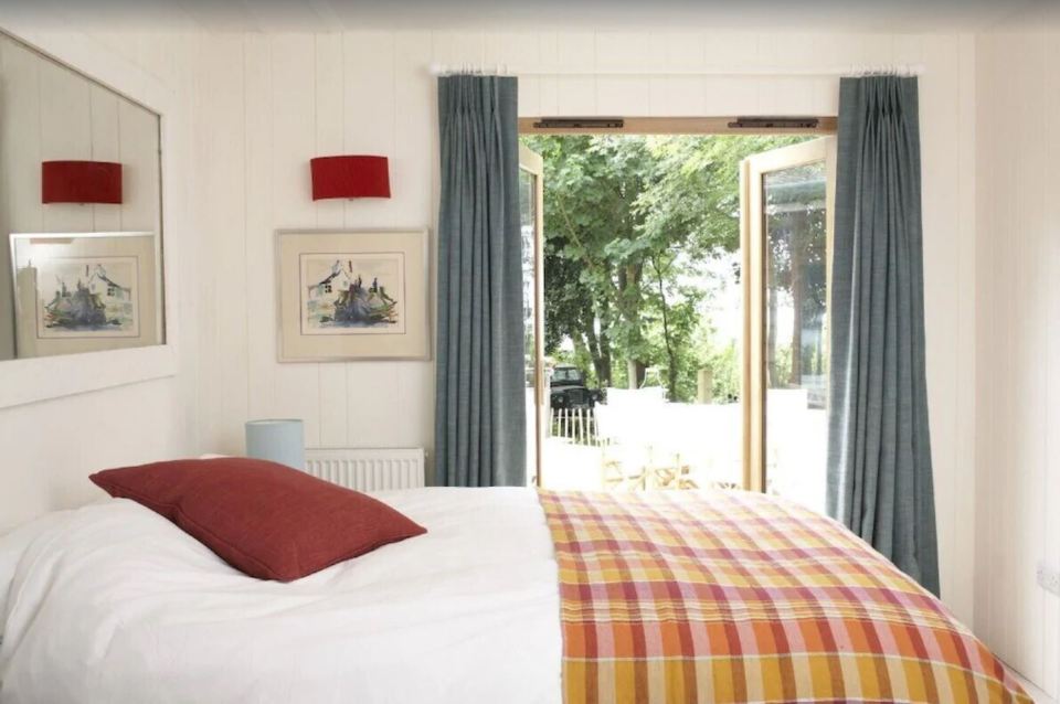 There are four bedrooms overlooking the large gardens