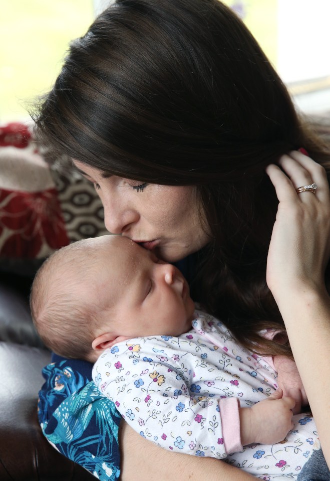 Katy was in shock when she was told of her dad's passing, but still had to feed Everleigh