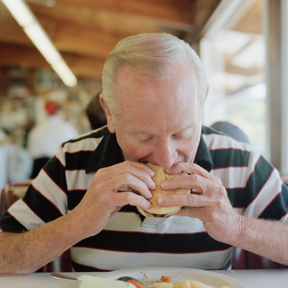 If you’re not using cutlery, prise your fingers off your food and put it down between each mouthful