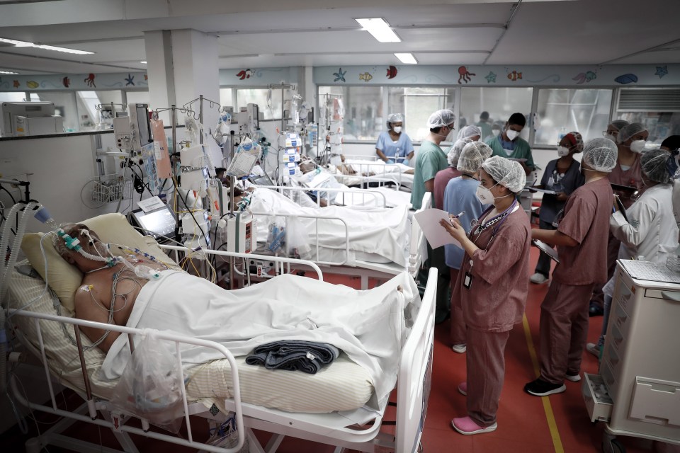 Doctors work at the ICU of the M'Boi Mirim Hospital, Sao Paulo, Brazil