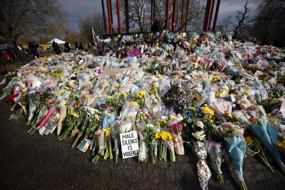 Thousands of flowers are left in Clapham in memory of Sarah