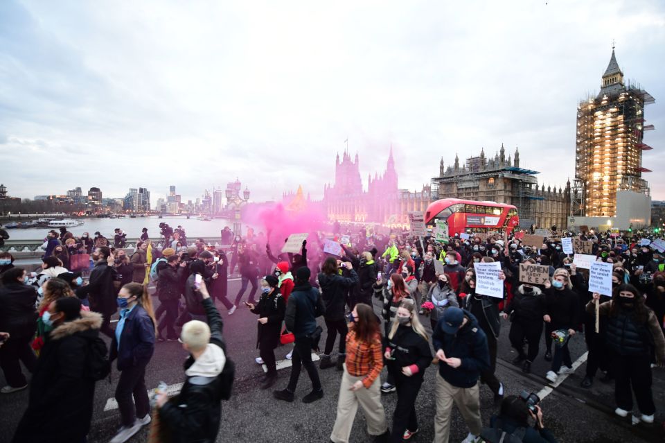 Protesters holding placards marched from Parliament Square to Westminster Bridge