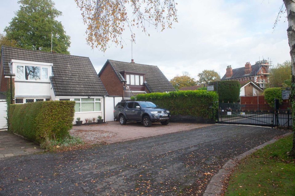 Hall is feared to have caused a housing slump on his suburban cul-de-sac in Cheshire