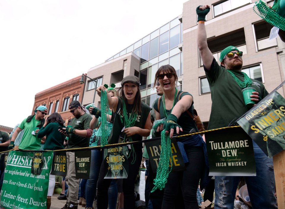 These people in Denver turn out to watch a parade celebrating St Patrick's Day