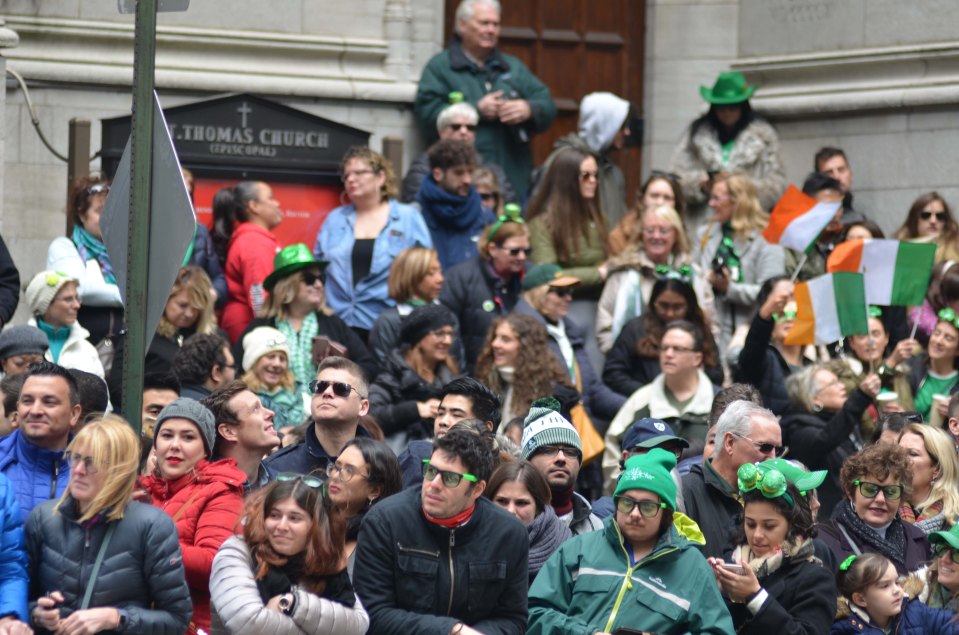 Thousands of people seen attending the annual St Patrick's Day Parade on 5th Avenue in New York City