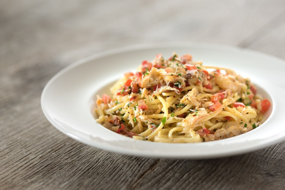 Crab with pasta, parsley and chilli