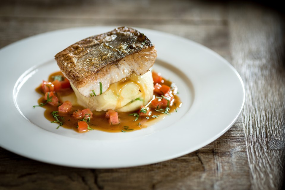 Grilled hake on spring mash with soy butter