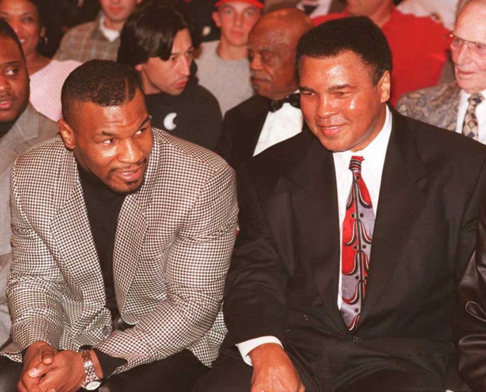 Mike Tyson pictured with Muhammad Ali