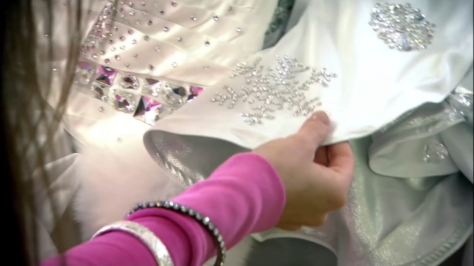 There's also snowflakes made from rhinestones all over the massive gown