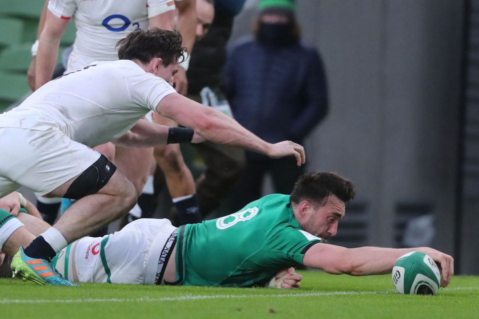 Ireland No8 Jack Conan stretches out to score