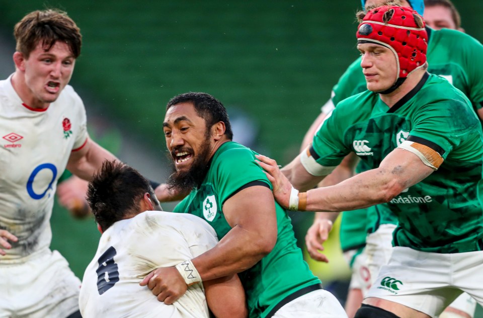 Aki crunches into Vunipola in the second-half at the Aviva Stadium in Dublin