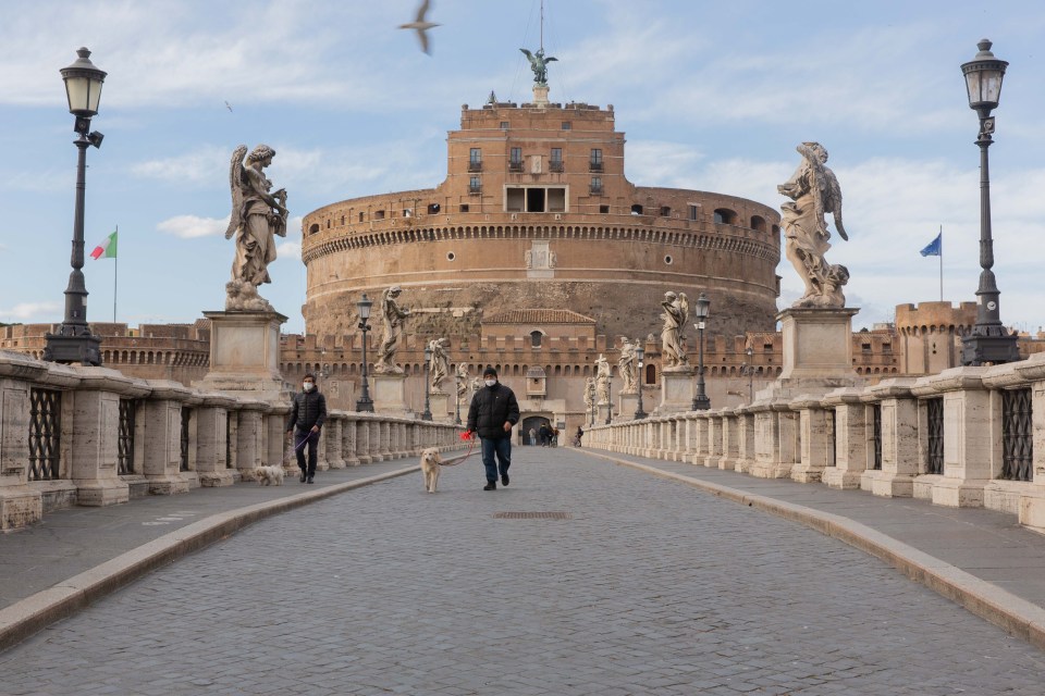 A string of countries were plunged back into Covid lockdown in the middle of March 2021. Pictured: Rome is under tighter restrictions until at least Easter. An empty Castel Sant'Angelo is pictured on March 22