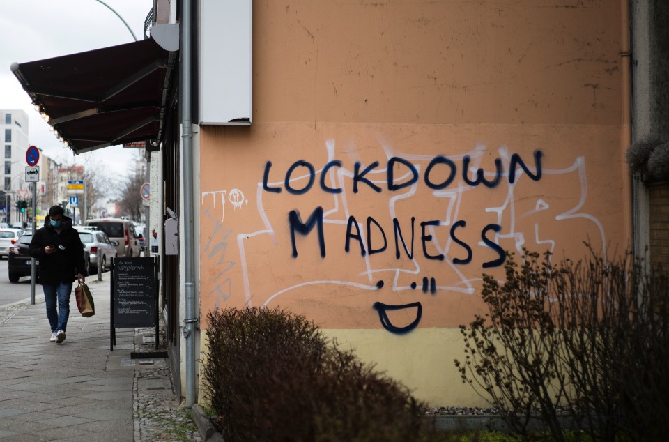 Germany has extended its lockdown measures by another month. Pictured: Grafitti reading "Lockdown Madness" in the district Schoeneberg in Berlin, Germany, Tuesday, March 23