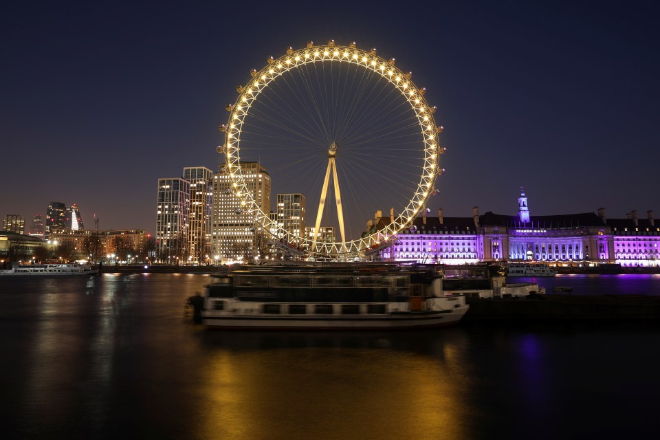 The London Eye was illuminated with yellow lights