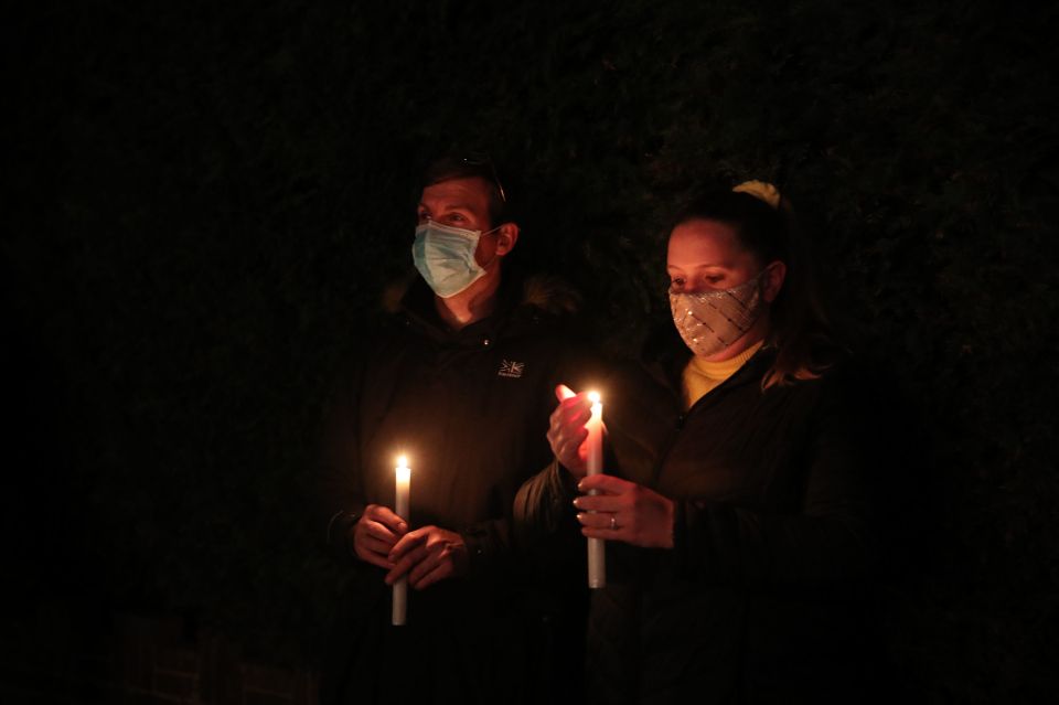 Families in Surrey wore masks as they lit up the night