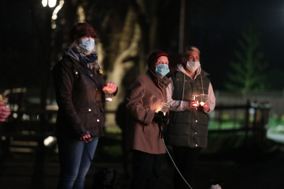 Members of the public outside the Old House at Home pub in Dormansland, Surrey