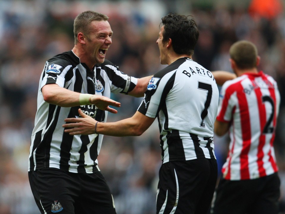 Barton celebrates with Kevin Nolan during Newcastle's 5-1 win over Sunderland in 2010