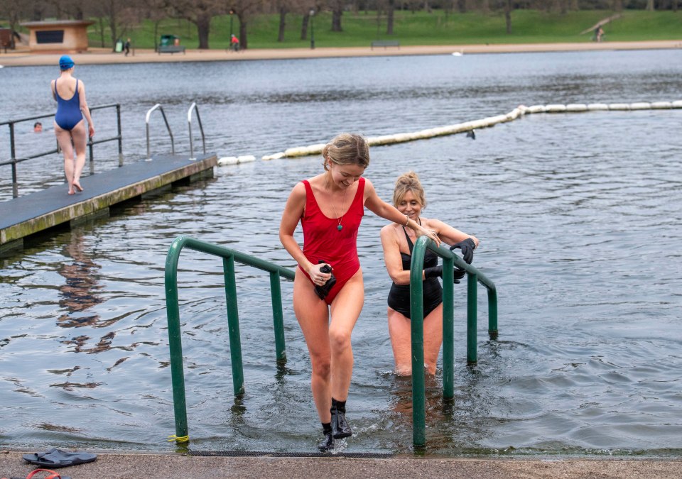 Members of the Serpentine Swimming Club swam in the Serpentine Lido first thing