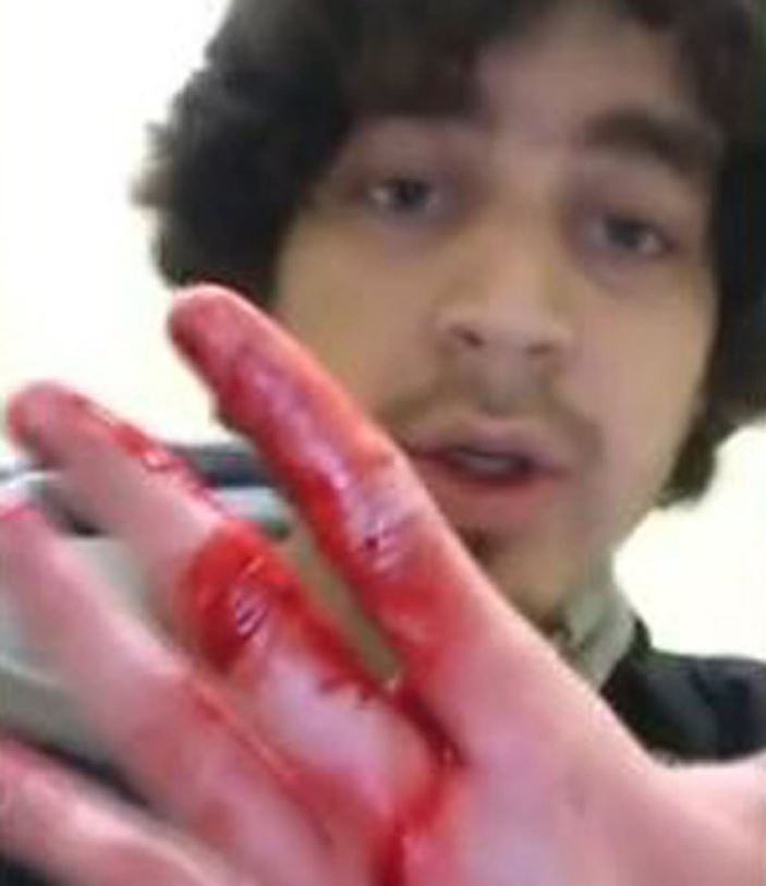 Mert Ney posted a video showing his blood-soaked hands, trousers and shoes after the murder