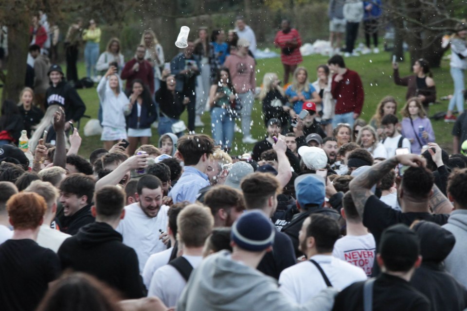 People sprayed alcohol over one another as a boozy brawl took place