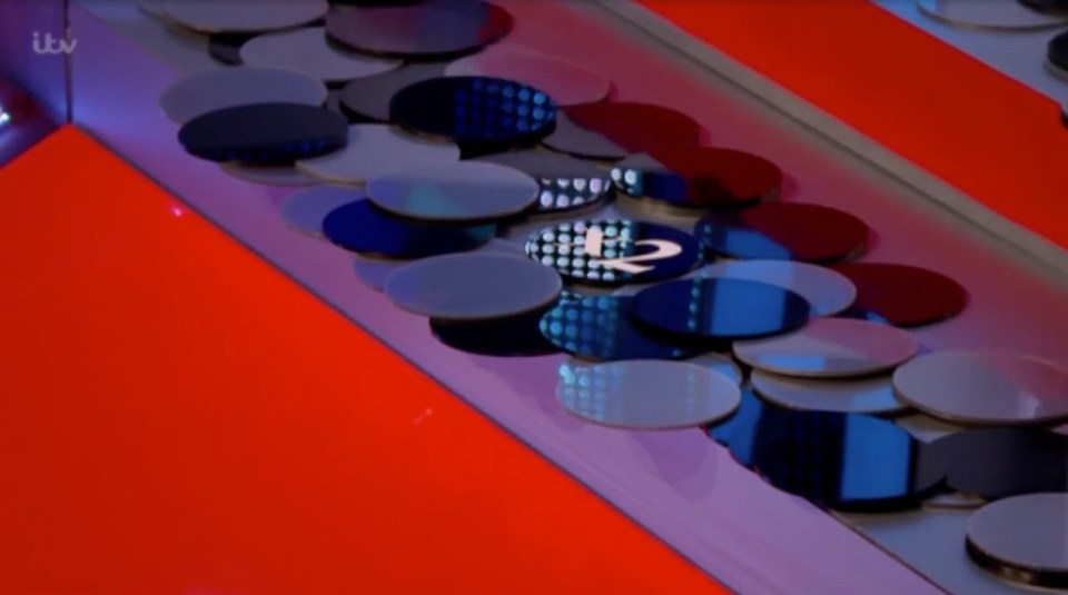 The ITV host was referring to how the counters were aligned on the coin pusher machine