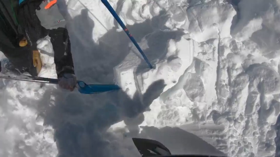 Video captured Forrest and other skiiers digging to try and free Lake