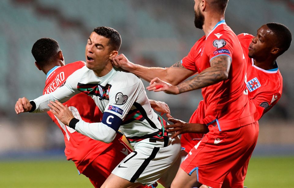 Cristiano Ronaldo felt the force of three Luxembourg players