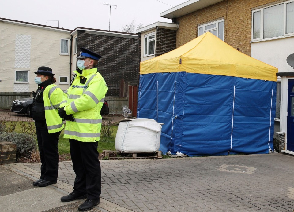 A forensic tent can be seen outside a home in Kent as police investigate