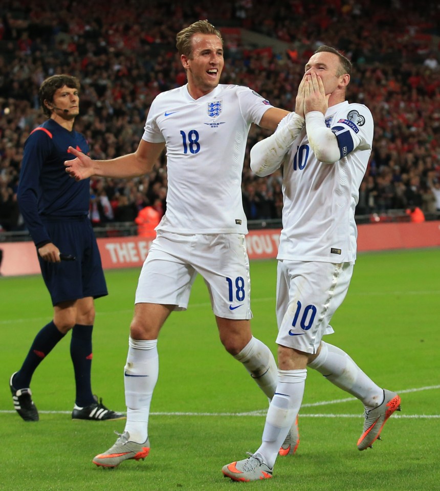 Wayne Rooney celebrates his record-breaking 50th goal for England, against Switzerland