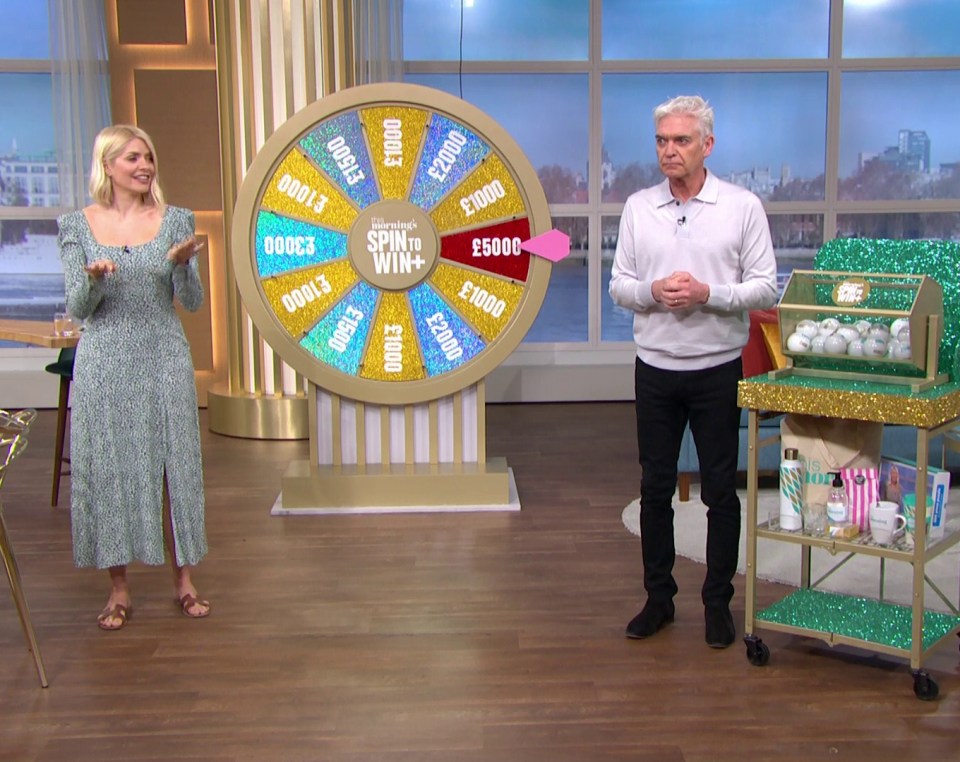 Holly and Phil had to swap places on Spin To Win because Holly couldn't use the tombola