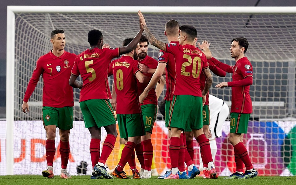 Portugla celebrate after Maksim Medvedev's own goal sunk Azerbaijan