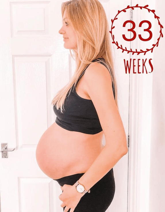 Rebecca while 33 weeks pregnant, just before she gave birth to her children via C-section