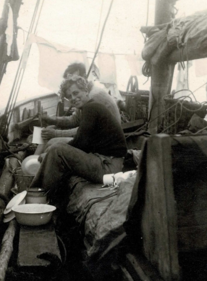 Philip pictured sailing at sea aged 15