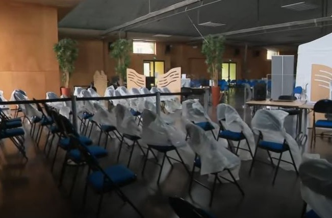 An empty vaccine centre in Calais, which was forced to close