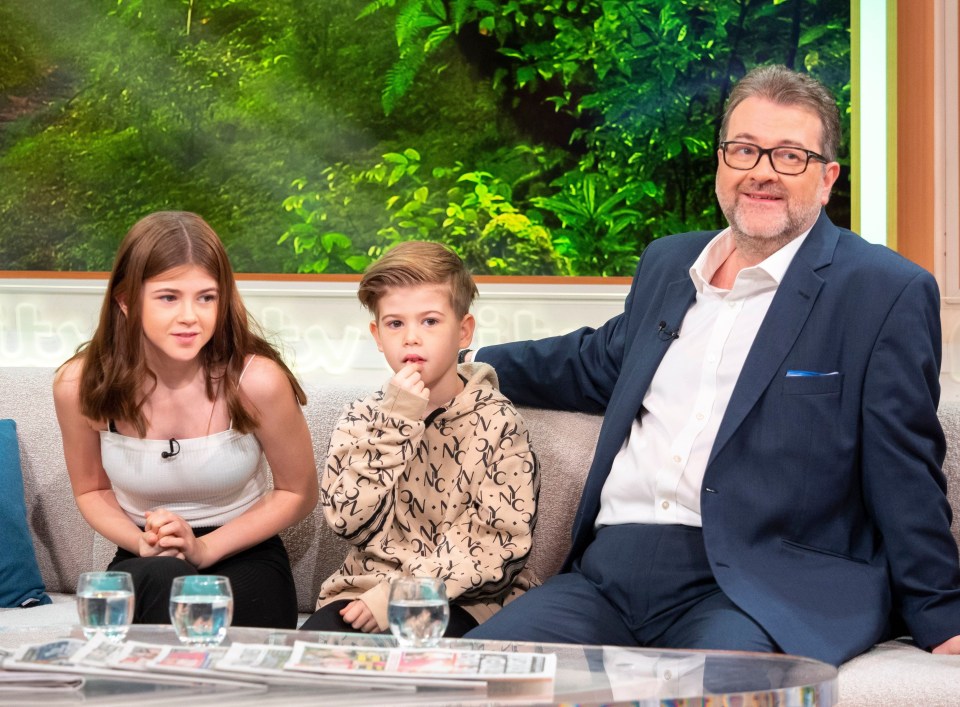 Derek 'burst into tears' when he saw his children; Darcey, 15, and Billy, 11. Pictured in 2019