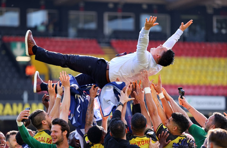 Watford players lift boss Xisco Munoz into the air