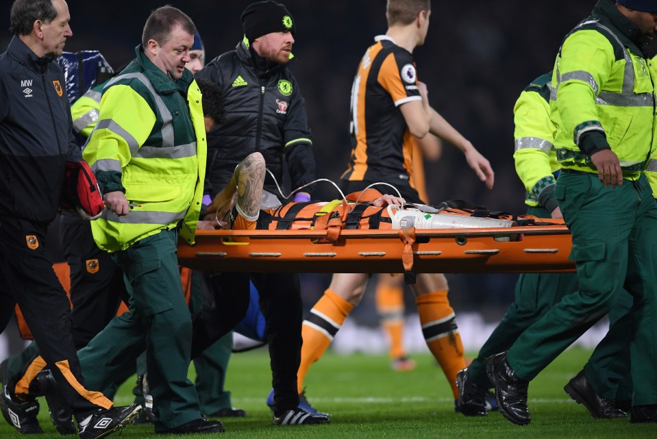 Mason stretchered off after suffering a horrific injury