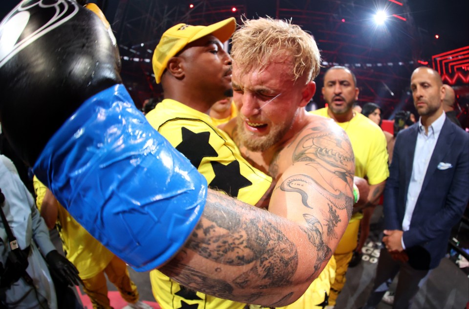 An emotional Jake Paul celebrates with his team after decimating Ben Askren