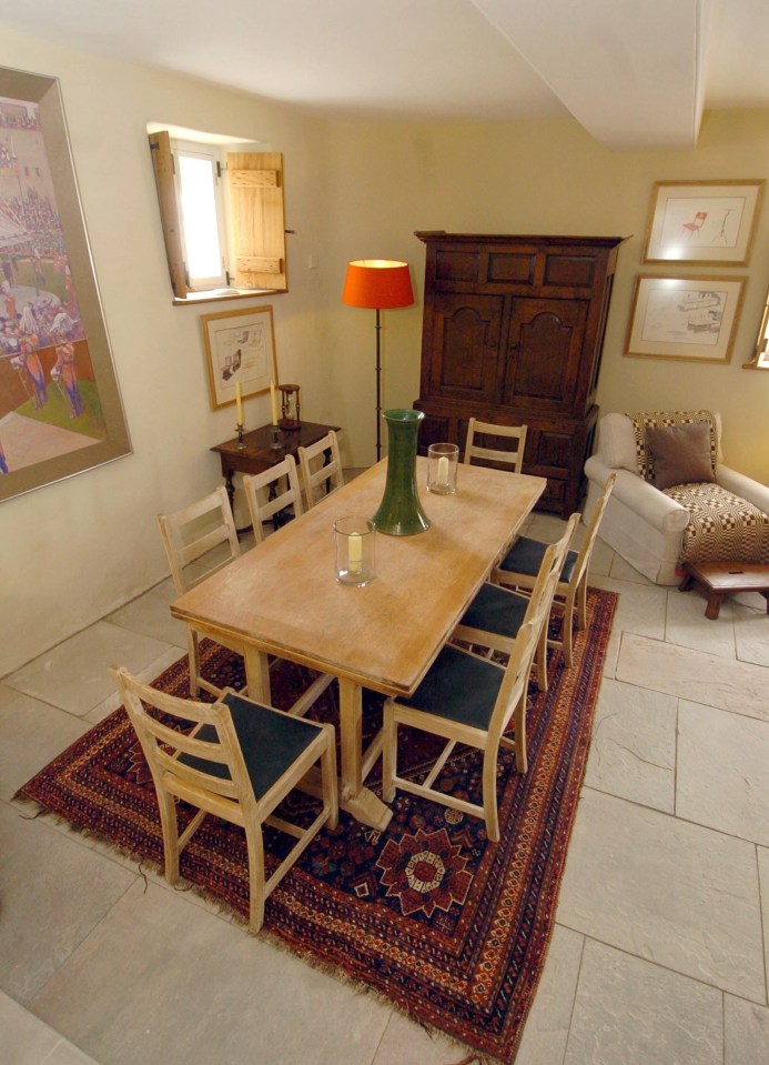 The main reception room features cosy furniture that matches the rest of the cottage