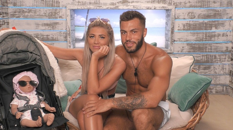 Paige and Finn with their 'baby' in the Beach Hut