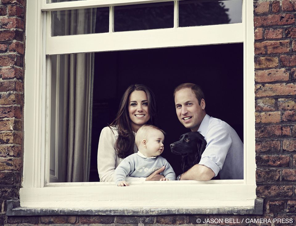 Look out . . . at Kensington Palace with George and the family's Cocker Spaniel Lupo in 2014