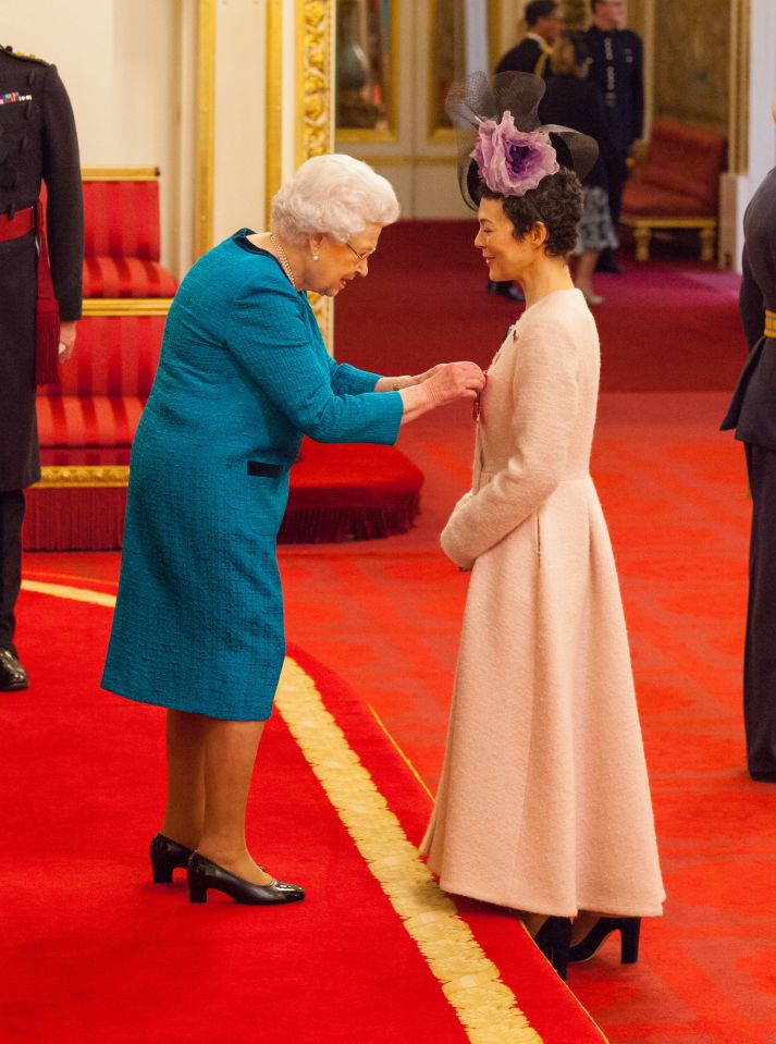 Proud moment for the actress as the Queen pinned on her lapel the honour