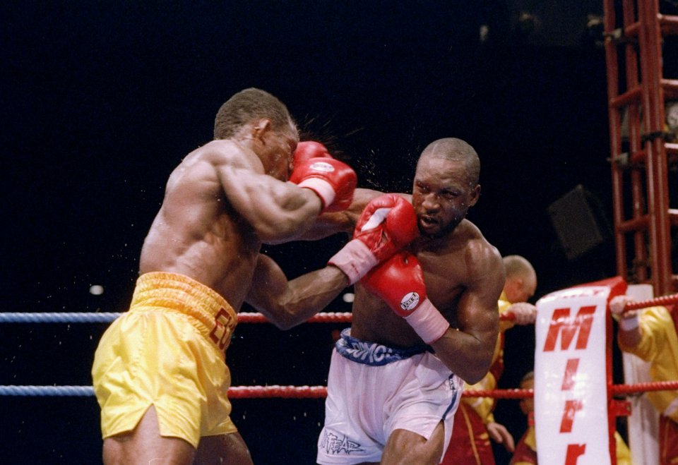 Boxing legend Nigel, right, trades blows with Chris Eubank in 1993