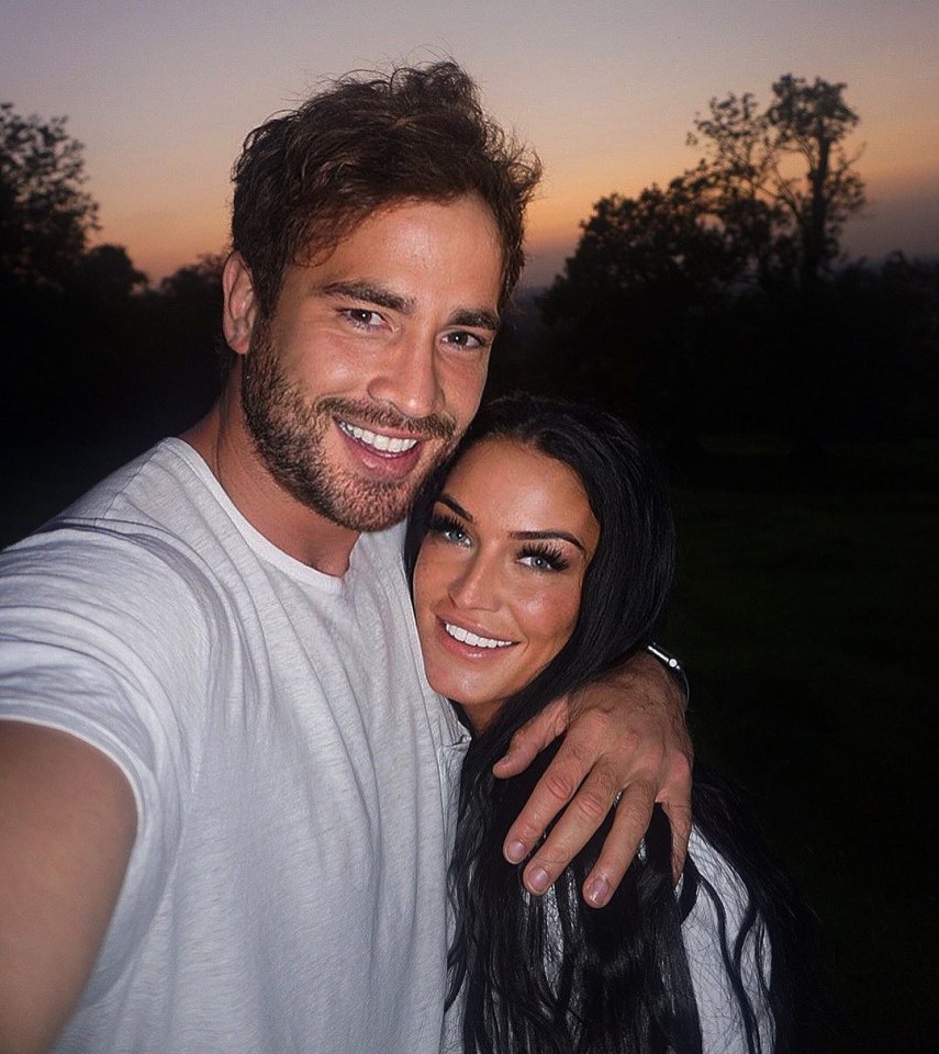 a man and a woman are posing for a picture together