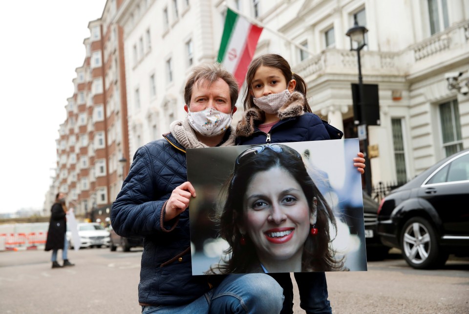 Nazanin's husband Richard Ratcliffe and their daughter Gabriella protesting outside the Iranian Embassy in London